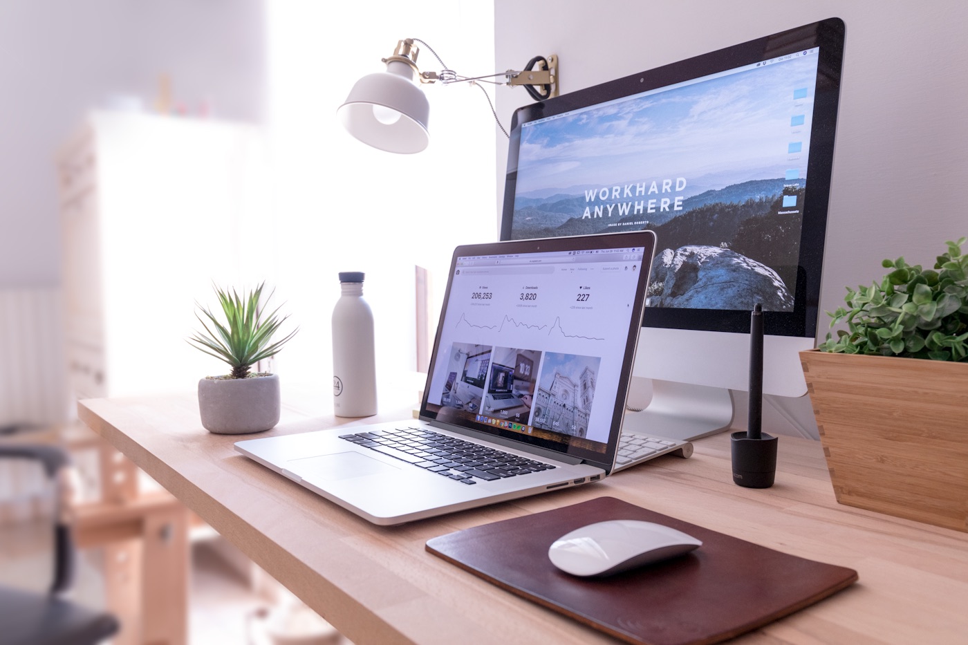 A clean modern laptop on a desk showing a web browser — a portfolio site built for one clear job